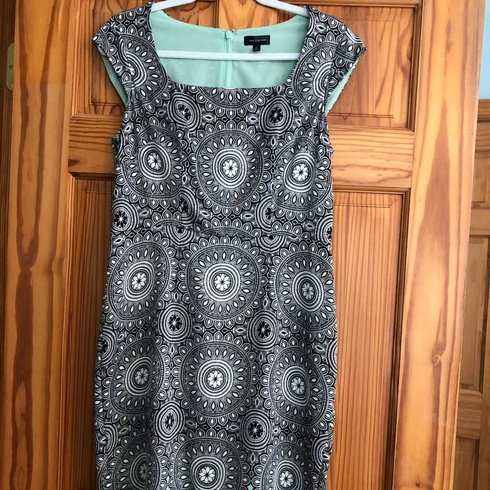 Cap-sleeve black, white, and pale green dress